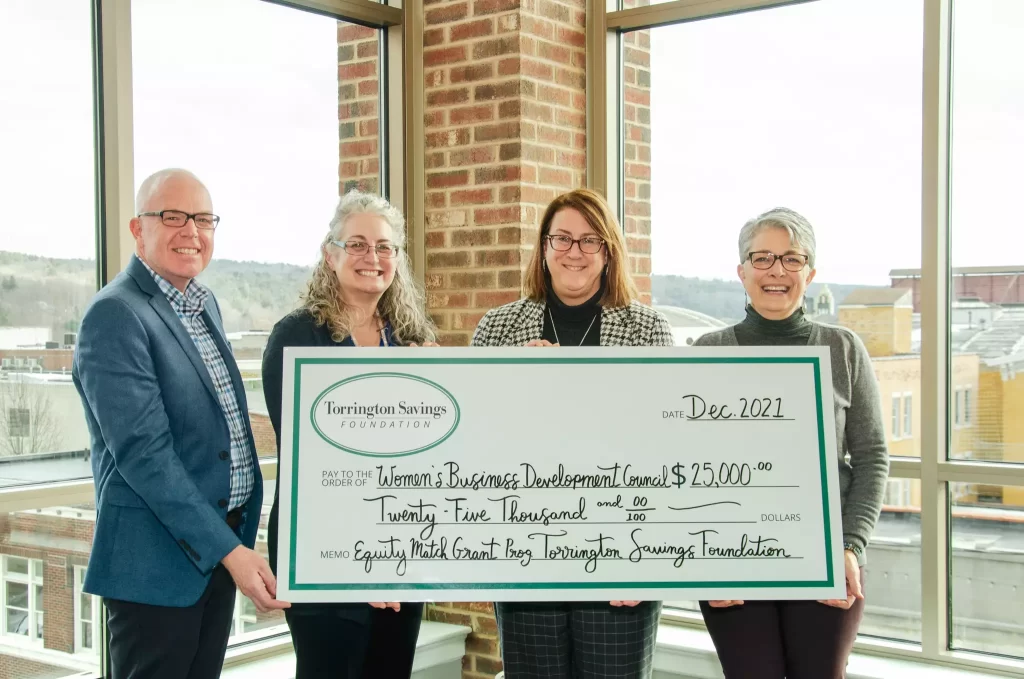 Check Presentation from Torrington Savings Foundation to WBDC in the amount of $25,000
