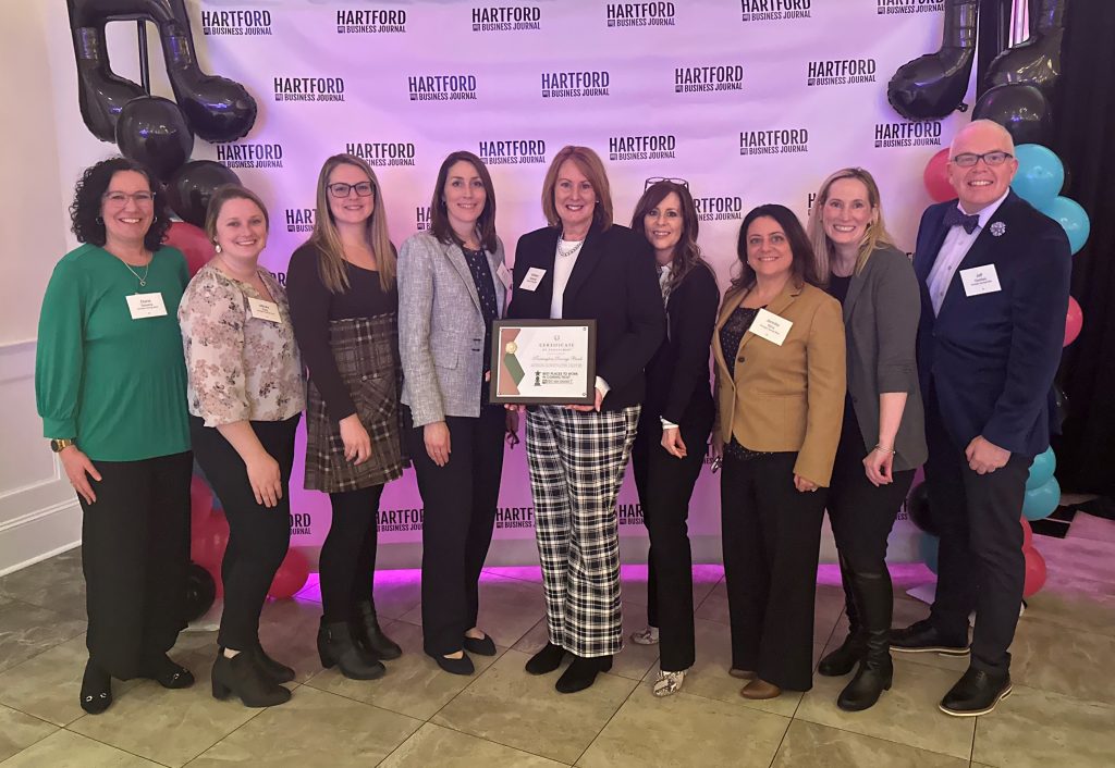 Torrington Savings Bank team accepting Best Places to Work Award